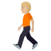 🚶🏼 person walking: medium-light skin tone display on JoyPixels